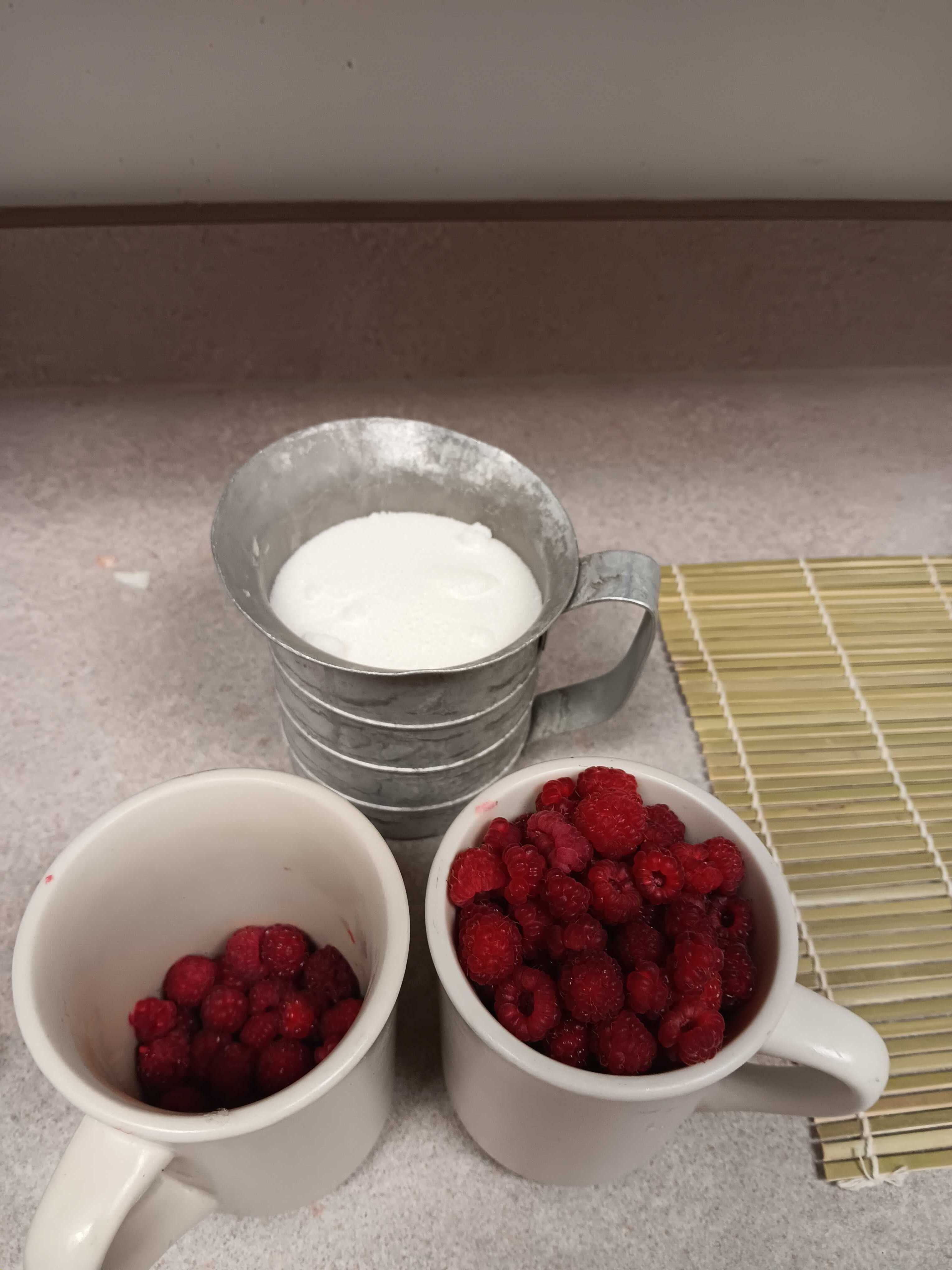A photo of some of my raspberries before jam-ification